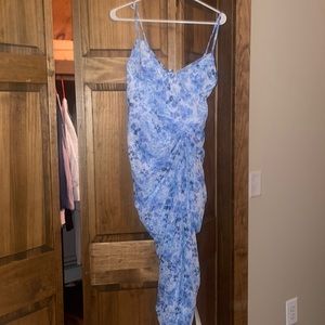 Blue floral dress. Pretty little thing size 6. Never warn tags are on